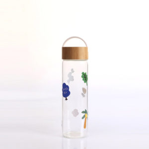 Glass carafe with bamboo lid printing on bottle